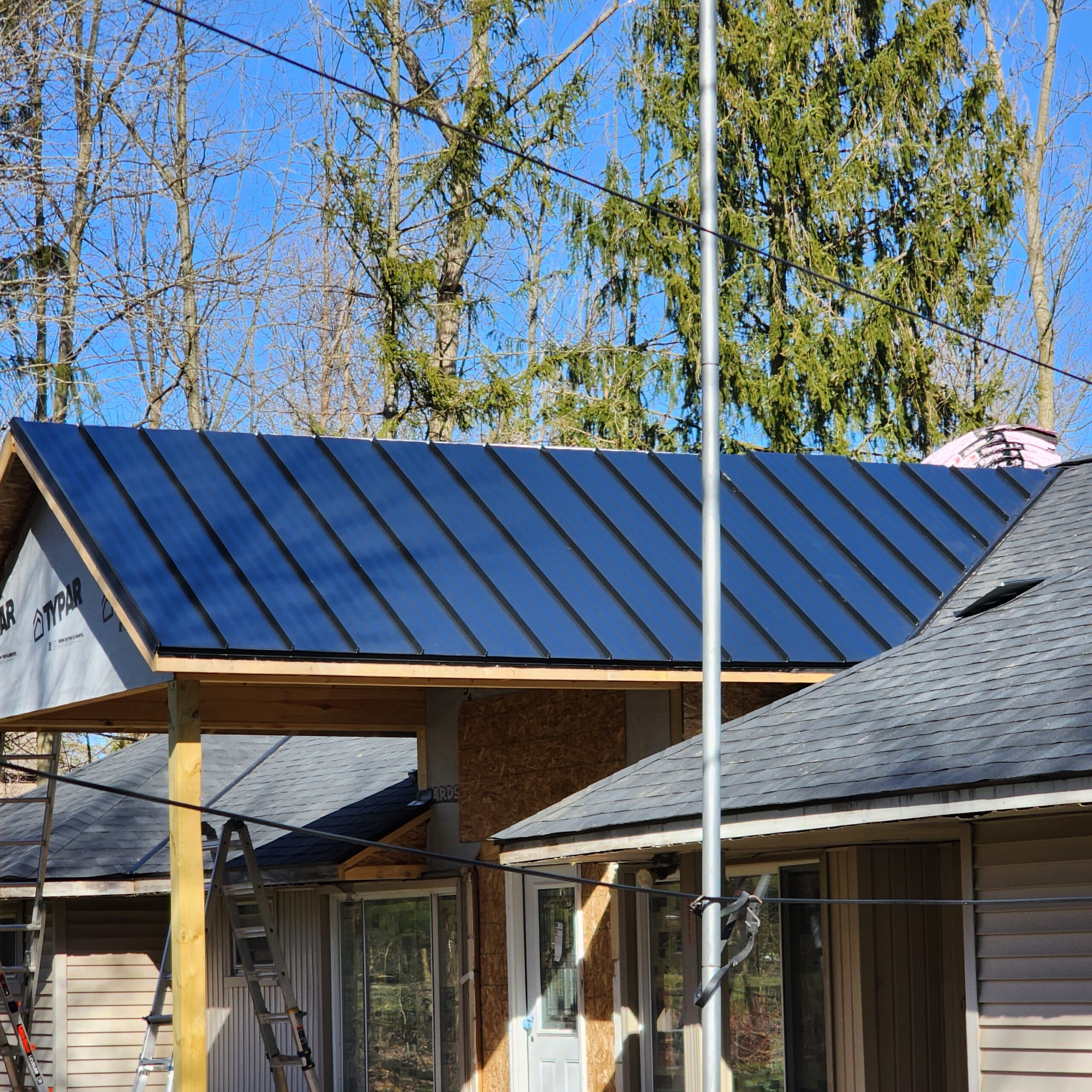 Can You Do a Metal Roof and Asphalt Shingle Roof Combination?