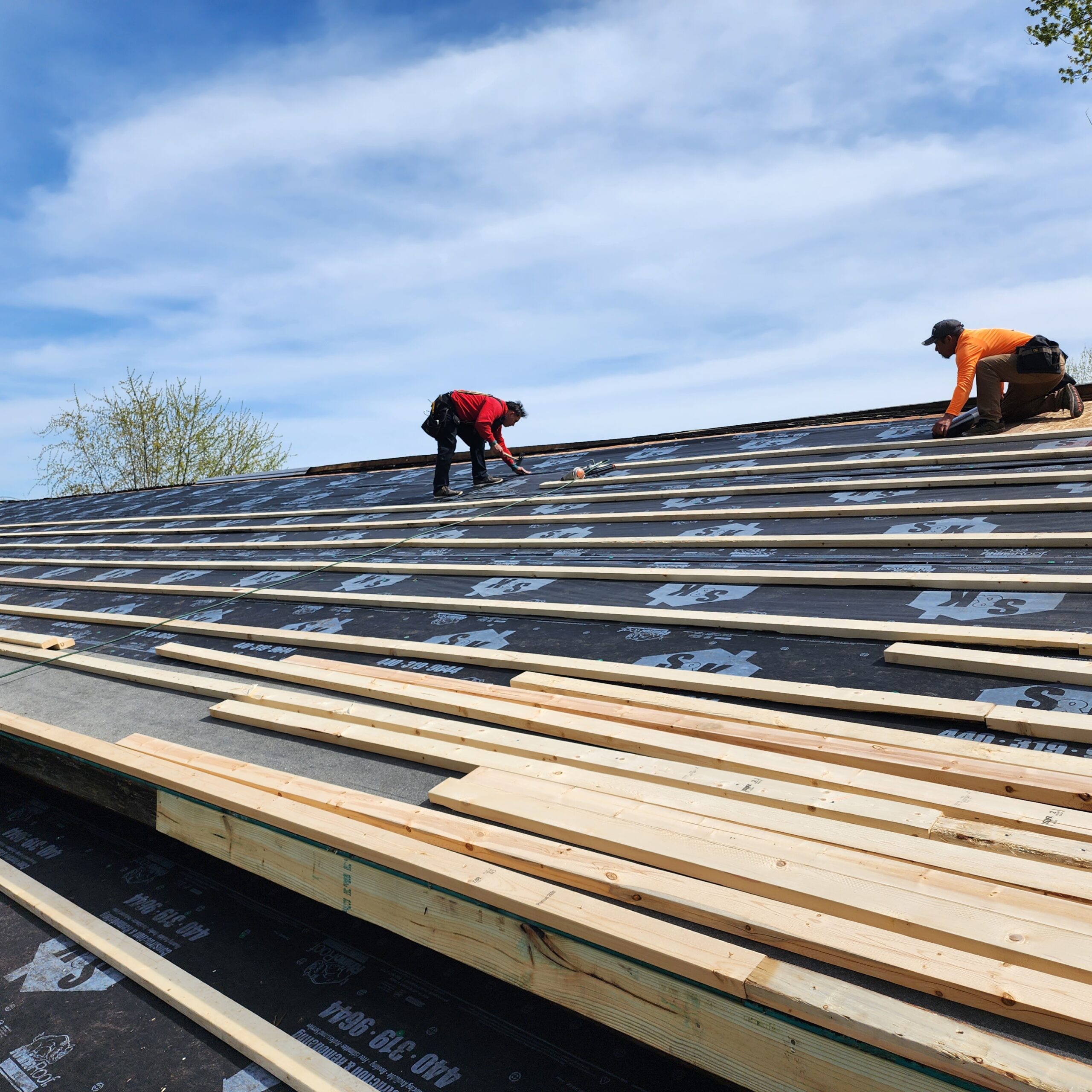 How Do You Identify Two Layers of Shingles on a Roof?