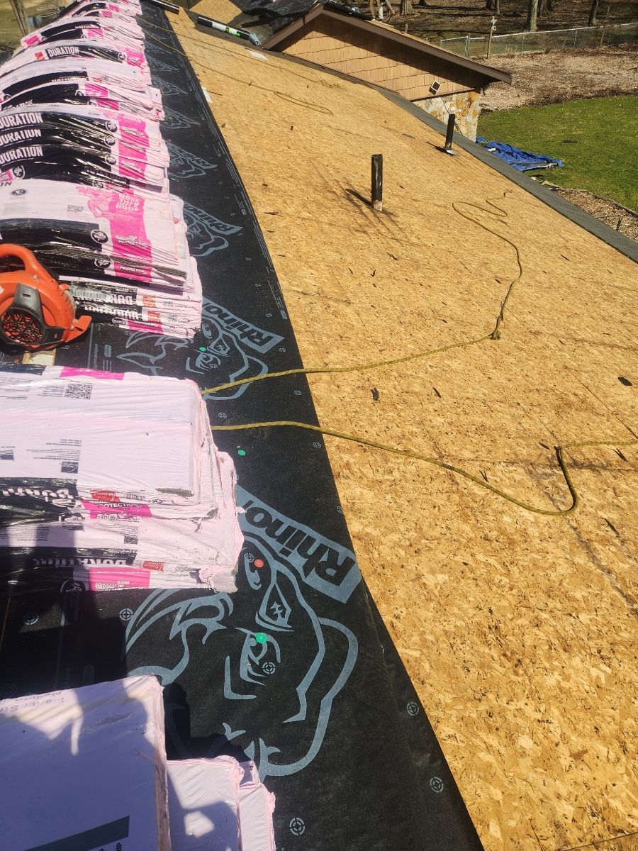 How to Properly Stack Asphalt Shingles on a Pitched Roof