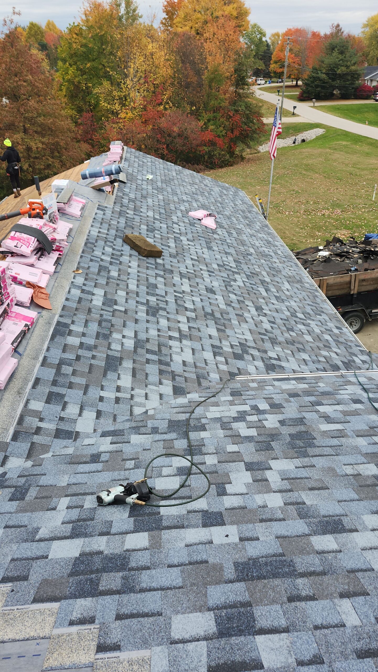 **Understanding Roof Overhang: A Comprehensive Guide to Its Importance and Benefits** A roof overhang is an essential component of a well-designed roofing system, but it often goes unnoticed unless there’s an issue. While its purpose may seem straightforward, a roof overhang offers numerous benefits, from protecting your home’s structure to improving energy efficiency and enhancing curb appeal. If you’ve ever wondered what a roof overhang is, why it’s important, and how it functions, this blog post will cover everything you need to know. In this detailed guide, we’ll break down the different types of roof overhangs, explain their components, and explore the many advantages of having a properly designed and maintained overhang. Whether you’re building a new home, remodeling your current one, or looking to replace your roof, understanding roof overhangs will help you make more informed decisions. ### What is a Roof Overhang? A roof overhang is the portion of the roof that extends beyond the exterior walls of a building. This overhang creates an extended roof edge that provides shelter and protection from the elements, including rain, snow, and sunlight. It is designed to shield the foundation, siding, and windows from direct exposure to weather, helping to prevent water damage, reduce maintenance needs, and increase the overall durability of your home. Typically, a roof overhang can vary in length, depending on the style of the home, climate, and design preferences. In addition to its protective functions, a roof overhang also plays a role in the aesthetics of the building, contributing to the overall architectural design. ### Why Is a Roof Overhang Important? Roof overhangs offer a variety of important functions that directly benefit the integrity of your home. Some of the key benefits of having a roof overhang include: #### 1. **Protection from the Elements** The primary function of a roof overhang is to shield the sides of your home from the elements. By extending beyond the exterior walls, it helps divert water away from the foundation, preventing soil erosion and water damage to the walls and siding. The overhang also provides shade, reducing the amount of sunlight that directly hits your windows and interior spaces, which can improve the longevity of your paint and siding materials. #### 2. **Water Drainage** Water drainage is one of the most critical aspects of roof design, and roof overhangs play a crucial role in this. They help direct rainwater away from the exterior walls and foundation of your home. Without an overhang, rainwater could flow directly down the sides of your house, increasing the risk of moisture damage, including mold growth and rot. A well-designed roof overhang works in conjunction with gutters to funnel water away from the foundation, helping to prevent costly damage to the structure. #### 3. **Energy Efficiency** Roof overhangs contribute to energy efficiency by reducing the amount of heat that enters your home. In hot climates, a roof overhang helps block direct sunlight from hitting the windows, which can lower the indoor temperature. This reduces the need for air conditioning, keeping your home cooler during the summer months and helping to reduce energy costs. In colder climates, overhangs can help keep the interior of the home warmer by preventing drafts and reducing the effects of wind. #### 4. **Aesthetic Appeal** Beyond their functional benefits, roof overhangs also enhance the aesthetic appeal of a home. A roof overhang can complement the architectural style of the building, giving it a more polished and finished look. Whether you prefer a traditional, contemporary, or modern design, an overhang adds depth and dimension to the roofline, making your home more visually appealing. #### 5. **Protecting Windows and Doors** Roof overhangs can protect the windows and doors of your home from water damage. By directing rainwater away from these areas, the overhang helps preserve the integrity of the seals, preventing leaks and water infiltration. This can extend the lifespan of your windows and doors and reduce the frequency of repairs or replacements. ### The Different Types of Roof Overhangs Not all roof overhangs are created equal. Depending on the style of your home and the climate in your area, you may need a specific type of overhang. Here are the most common types of roof overhangs: #### 1. **Eave Overhangs** Eave overhangs are the most common type of roof overhang and are found on the horizontal edges of the roof, where it extends beyond the exterior wall. The eaves are typically designed to be the first line of defense against rainwater, and they are often equipped with gutters to catch and direct the water away from the home. The length of eave overhangs can vary based on the climate and design preferences, but they generally extend anywhere from 12 inches to 24 inches or more. #### 2. **Rake Overhangs** Rake overhangs are located at the gable ends of a roof. They extend beyond the peak of the roofline, typically at the point where the roof meets the wall at the side of the house. Rake overhangs provide the same benefits as eave overhangs, including water diversion and protection, but they are found at a different location on the roof. These overhangs are particularly common in homes with a gable or pitched roof design. #### 3. **Dormer Overhangs** Dormer overhangs are small overhangs that are typically found on dormer windows. A dormer is a structure that protrudes from the sloping roof, often with a window, to add extra space or light to an attic. The dormer overhang helps protect the window and creates a more finished, architectural appearance. Dormer overhangs are typically smaller in size compared to eave or rake overhangs but are still important for providing weather protection. #### 4. **Canopy Overhangs** Canopy overhangs are larger roof extensions that provide shelter over an entrance, patio, or other outdoor spaces. These overhangs can be attached to the main roof or stand alone as a separate structure. Canopy overhangs provide additional protection from the elements and often enhance the functionality of outdoor spaces. These overhangs are particularly useful in areas with heavy rainfall, snow, or sun exposure. #### 5. **Deep Overhangs** Deep overhangs are typically seen in homes designed for warmer climates or where sun protection is essential. These overhangs are designed to extend farther than standard eave overhangs, often reaching several feet beyond the exterior walls. Deep overhangs offer extended shade, preventing sunlight from entering windows during the hottest parts of the day and helping to reduce the heat load on the home. ### Common Materials for Roof Overhangs The materials used for roof overhangs can vary depending on your design preferences, budget, and climate. The choice of materials for your roof overhang will impact its durability, functionality, and appearance. Below are some of the most common materials used for roof overhangs: #### 1. **Wood** Wooden overhangs are a traditional and aesthetically appealing option. They can be crafted from various types of wood, including cedar, pine, and redwood. While wooden overhangs offer a natural look that complements many architectural styles, they require more maintenance than other materials. Wooden overhangs need to be treated and sealed regularly to protect against moisture, pests, and rot. #### 2. **Vinyl** Vinyl is a low-maintenance material that is commonly used for roof overhangs. It is weather-resistant, durable, and comes in a variety of colors and finishes. Vinyl overhangs are a popular choice for homeowners looking for a cost-effective and easy-to-maintain option. They are resistant to mold, mildew, and insects, making them an excellent choice for humid climates. #### 3. **Aluminum** Aluminum is another popular material for roof overhangs, especially for homes located in areas with heavy rain or snow. Aluminum is lightweight, rust-resistant, and durable. It can be painted or coated to match the exterior of your home, and it requires minimal maintenance. Aluminum overhangs are also energy-efficient, as they help reflect sunlight away from the roof and keep your home cooler. #### 4. **Steel** Steel overhangs are often used for commercial buildings or modern residential homes. Steel is highly durable, fire-resistant, and weather-resistant, making it a great choice for areas with extreme weather conditions. While steel overhangs may require more initial investment, their long-lasting nature makes them a cost-effective option in the long run. #### 5. **Composite Materials** Composite materials are made from a combination of wood fibers and synthetic materials. These overhangs offer the appearance of wood but are more durable and require less maintenance. Composite materials are resistant to rot, insects, and moisture, making them ideal for homes located in areas with high humidity or frequent rainfall. ### Maintenance and Care for Roof Overhangs Maintaining your roof overhang is essential for ensuring its longevity and functionality. Here are some important maintenance tips for roof overhangs: #### 1. **Regular Inspections** Inspect your roof overhang regularly for signs of damage or wear. Check for cracked or missing panels, damaged gutters, or signs of moisture damage. If you notice any issues, address them promptly to prevent further damage to your home. #### 2. **Cleaning Gutters and Vents** Ensure that gutters and soffit vents are clear of debris, such as leaves, twigs, and dirt. Clogged gutters can cause water to overflow and damage the fascia board, roof, and foundation. Similarly, clogged vents can reduce airflow and lead to moisture buildup in the attic. #### 3. **Seal Cracks and Gaps** Check for cracks or gaps along the roof overhang and seal them with a weatherproof sealant. This will help prevent water infiltration and reduce the risk of pest infestations. #### 4. **Repainting and Refinishing** If your roof overhang is made of wood, it may require periodic painting or refinishing to protect it from the elements. Use high-quality, weather-resistant paint to ensure the overhang remains in good condition for years to come. #### 5. **Pest Control** Ensure that there are no pests nesting in your roof overhang or soffit areas. Check for signs of insects, birds, or rodents, and take appropriate steps to remove them before they cause damage. ### Conclusion A roof overhang is a vital component of your home’s roofing system that offers a range of practical benefits, from protecting your home from the elements to improving energy efficiency and enhancing curb appeal. Understanding the different types of roof overhangs, the materials used for their construction, and their role in your home’s overall functionality will help you make informed decisions when it comes to maintaining or replacing your roof. By taking proper care of your roof overhang, you can ensure that it continues to protect your home for years to come, keeping your foundation, siding, windows, and doors safe from water damage and enhancing your home’s aesthetic appeal.